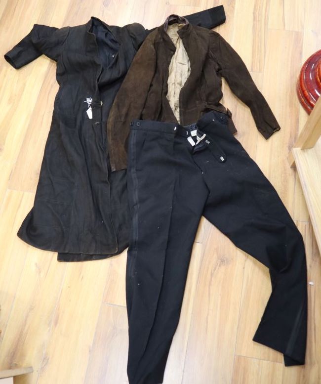 A 1930s-40s ladies suede coat and a later suede jacket and a pair of gentlemans trousers